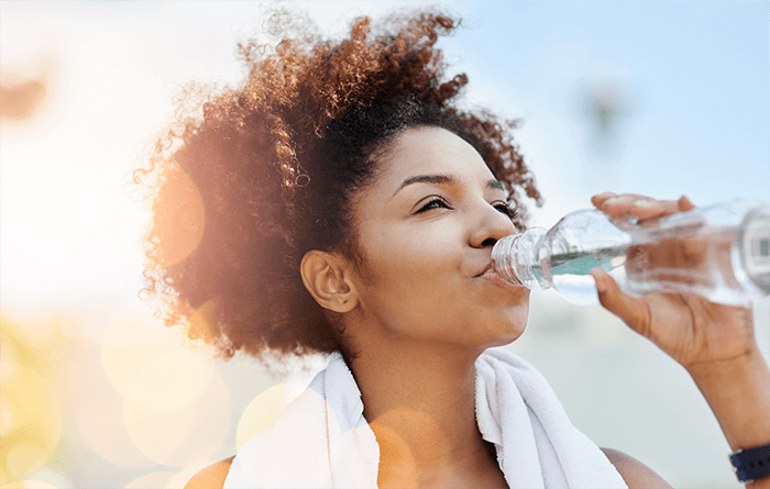 woman drinking 700x445px